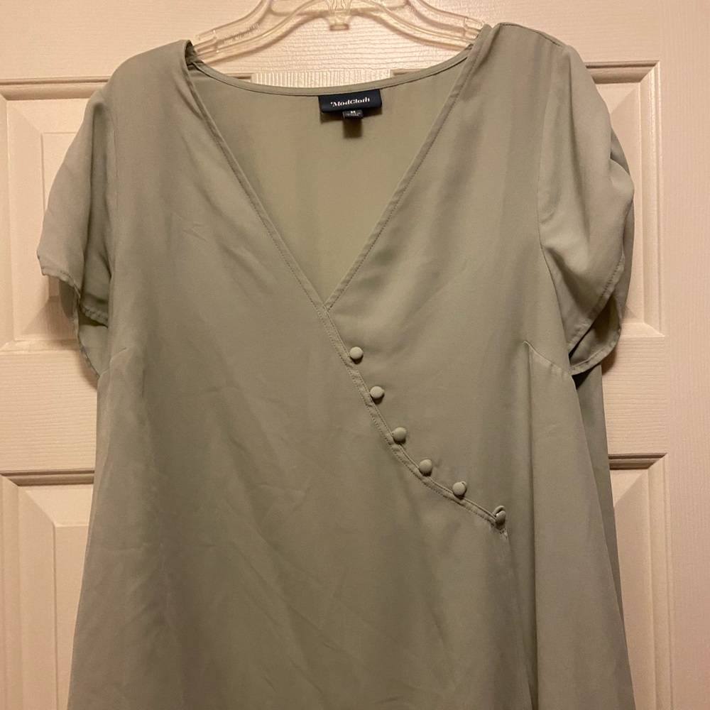 Green ModCloth top in M with button detailing